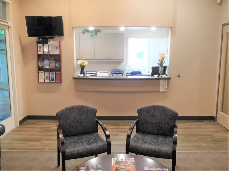 The reception window and seating at Golden Triangle Dentistry.